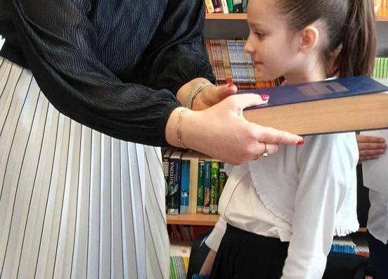 Grafika 9: Pasowanie na czytelnika