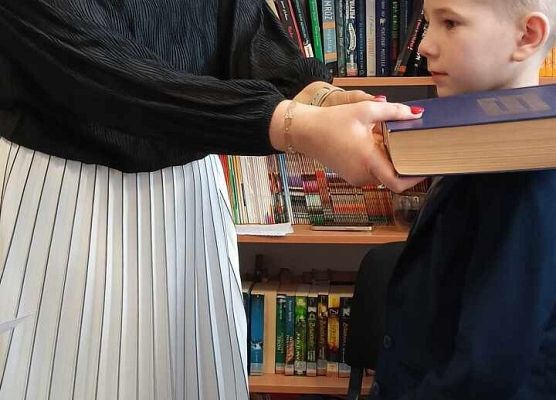 Grafika 14: Pasowanie na czytelnika