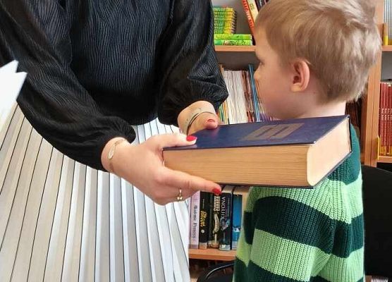 Grafika 17: Pasowanie na czytelnika