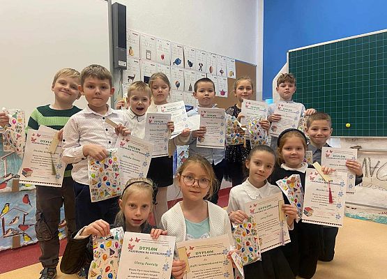 Grafika 23: Pasowanie na czytelnika