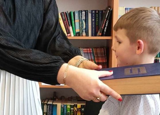 Grafika 24: Pasowanie na czytelnika